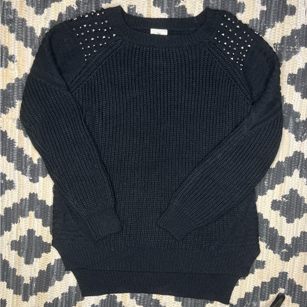 Black sweater with studded shoulders